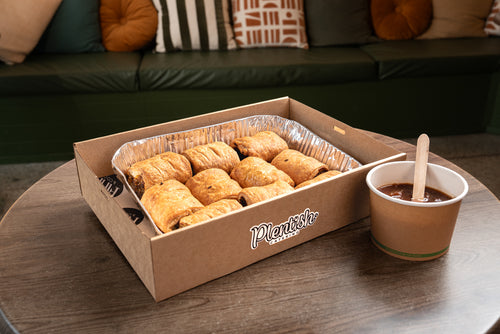 Freshly baked beef sausage rolls for team meetings, parties, and celebrations delivery in Sydney and the Blue Mountains