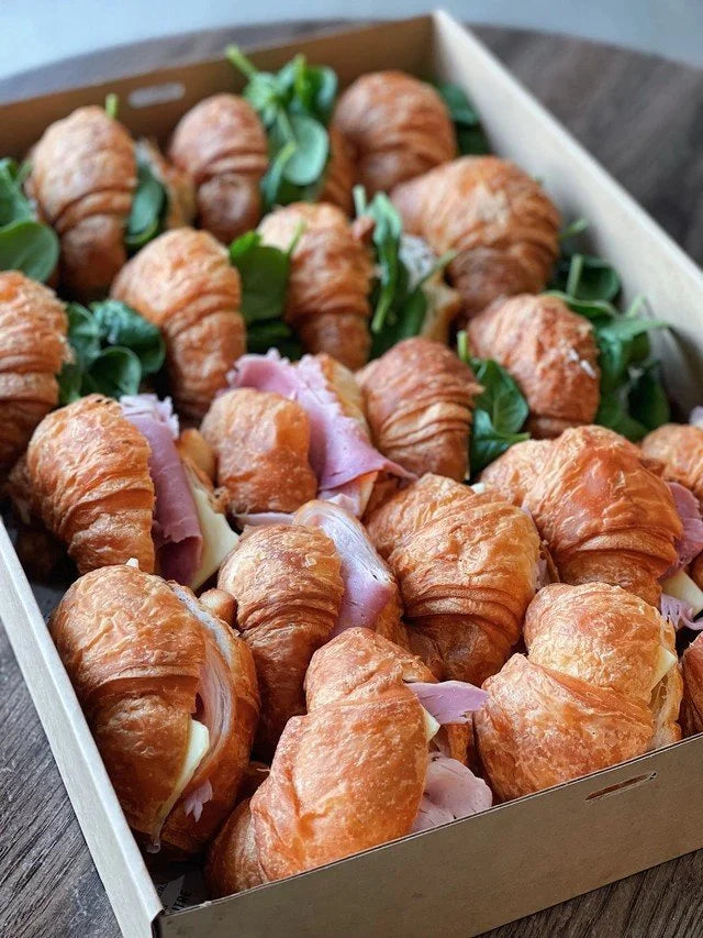 Flaky cocktail croissants filled with ham and cheese, and feta a spinach. Share-style platter, grazing, brunch. Delivery in Sydney and the Blue Mountains 